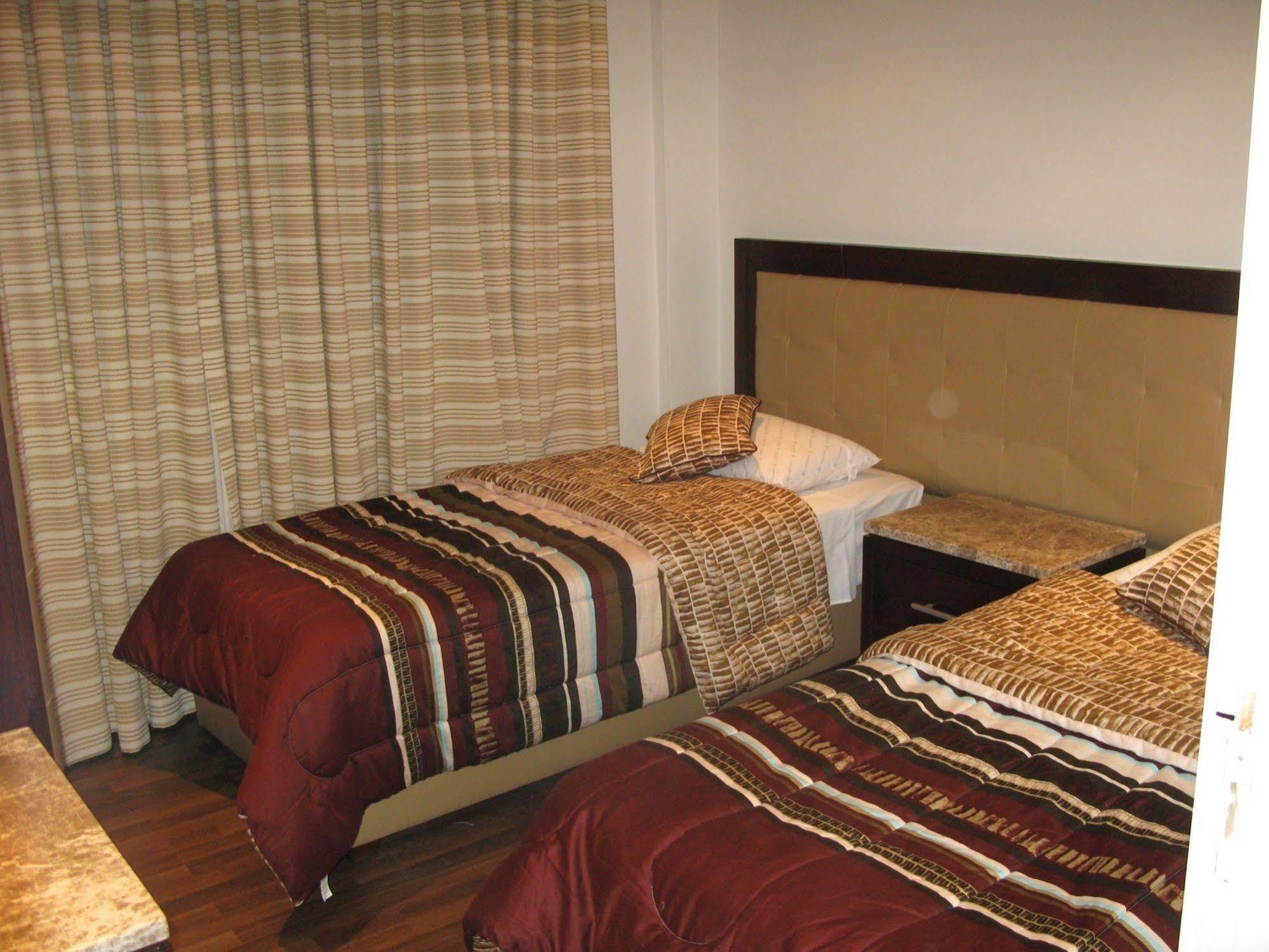 Granada Suites Hotel Аман Екстериор снимка